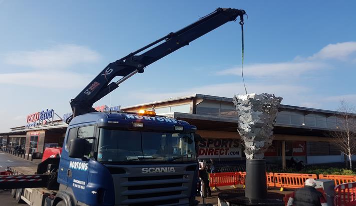 Sculpture lifted transported Salford to Leigh