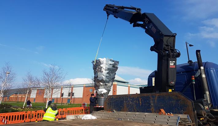 Sculpture lifted transported Salford to Leigh